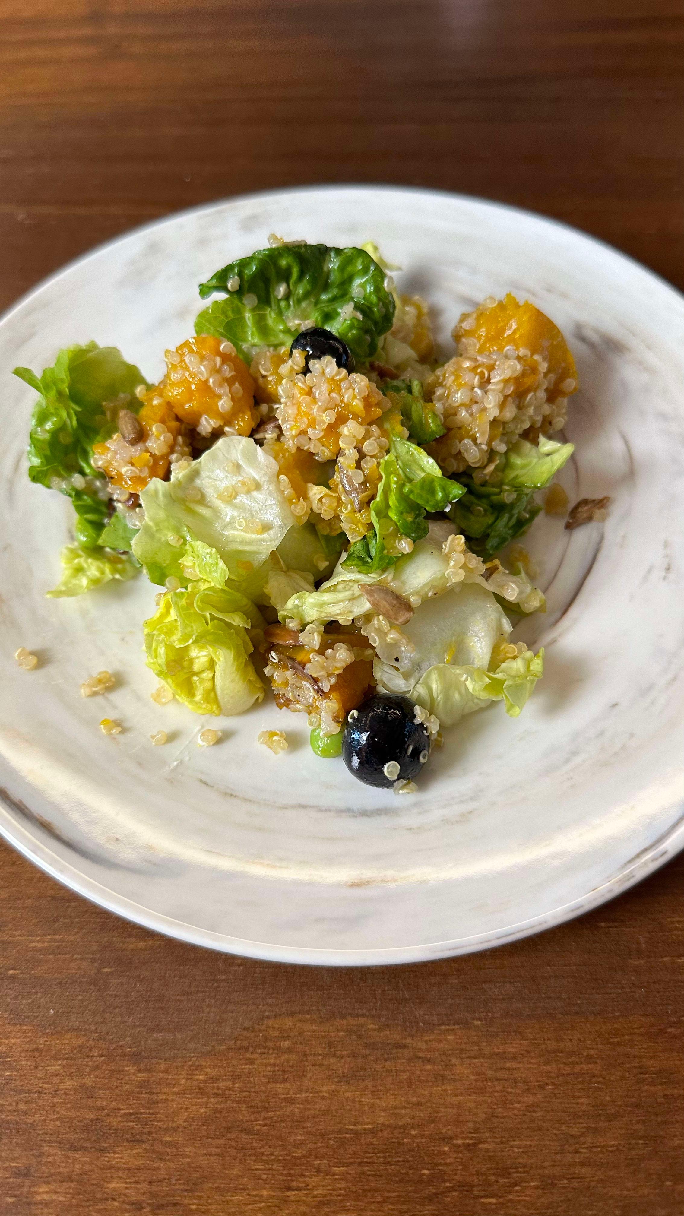 Quinoa, Pumpkin, Nuts and Berries Salad with Winter Dressing